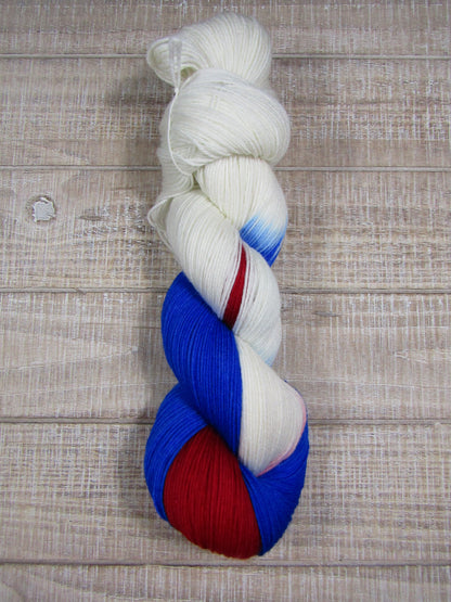 Hand-Dyed Yarn Liberty Superwash Merino/Nylon in red, white, and blue yarn
