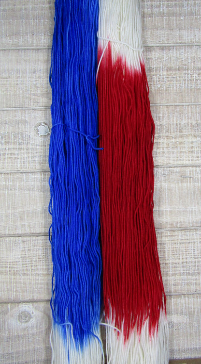 Hand-Dyed Yarn Liberty Superwash Merino/Nylon in red, white, and blue yarn
