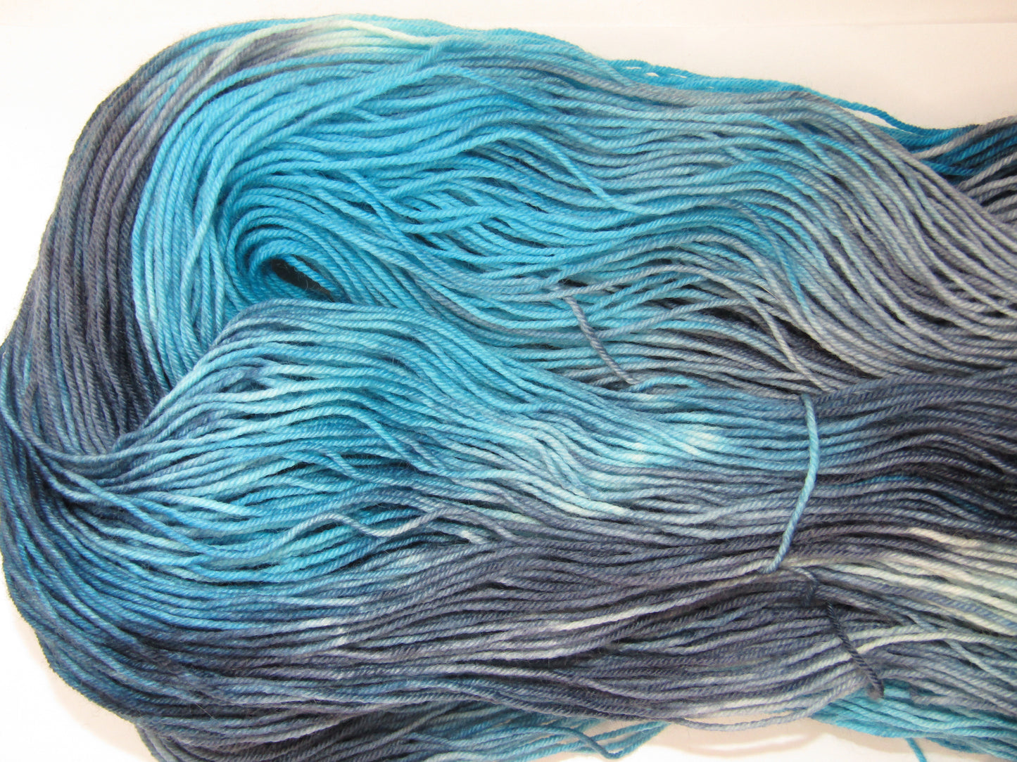 Hand-Dyed Yarn Barnaby Single Skein of yarn in shades of blued steel and aqua.  