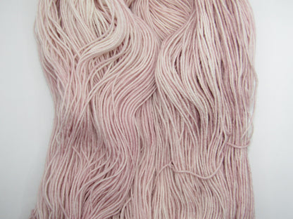 Hand-Dyed Yarn Marilyn is a light mauve color.