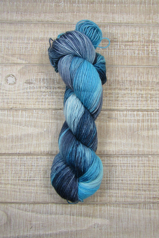 Hand-Dyed Yarn Barnaby Single Skein of yarn in shades of blued steel and aqua.